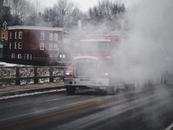 Heavy machinery truck on highway